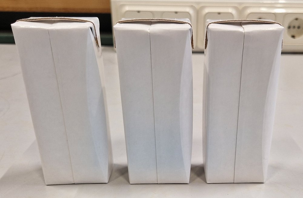 Uniform, defect-free packaging cartons, system active